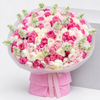 Blush Garden Melody with blush garden roses, pink spray roses, white roses, and white snapdragons styled as a beautiful hand-tied bouquet in premium matte wrapping. 